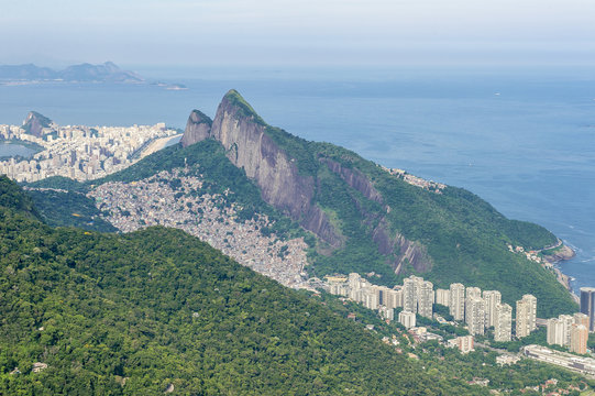 Scenic landscape skyline view of the Two Brothers Mountain from the popular hiking destination of Pedra Bonita in the Tijuca National Forest in Rio de Janeiro, Brazil