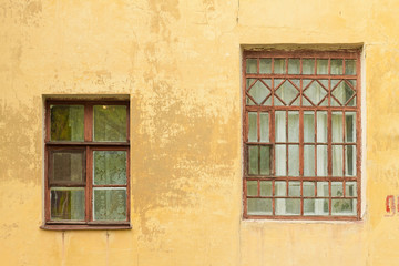 Big and small. The windows of the old house
