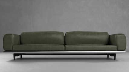 Grünes Sofa aus Leder vor Wand