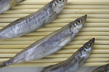 shishamo sushi on bamboo.