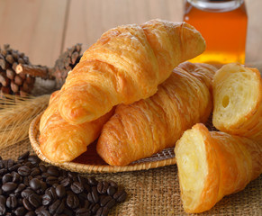 croissant on wooden background