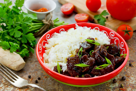 Mongolian meat in sauce with rice
