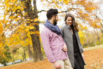 Young couple in the autumn park