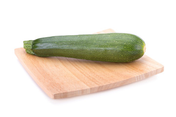 green zucchini vegetables isolated on white