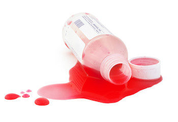 Isolated medicine bottle spill