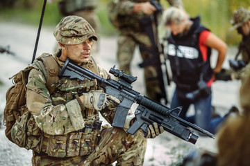 Army sniper during the military operation in the mountain. war,