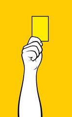 Referee hand showing yellow card