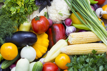 Background of fresh vegetables and greens closeup