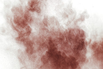 abstract powder splatted background,Freeze motion of white powder exploding/throwing brown powder