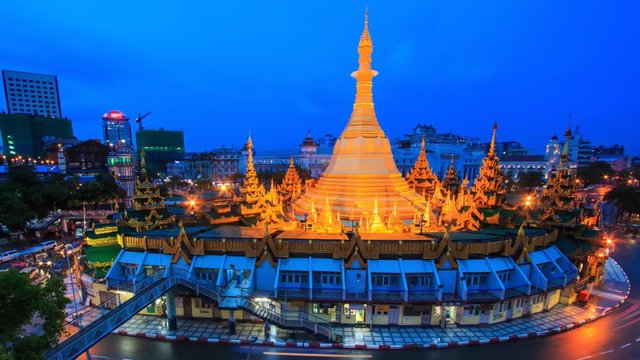 Sule Pagoda Landmark Ancient Pagoda Day To Night Time Lapse Of Yangon City, Myanmar (zoom in)
