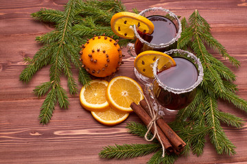 Glasses of mulled wine on wooden table