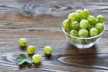 Ripe greeen gooseberries in a glass bowl