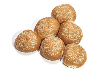 Golden Hamburger Buns Arranged in Shape of Triangle