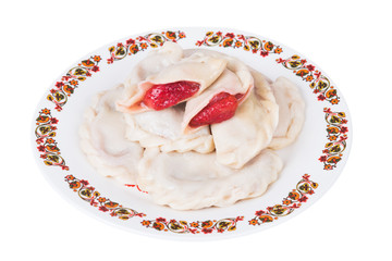 Ukrainian dumplings with strawberries on plate, isolated