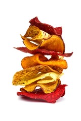 Pile of mixed healthy vegetable chips isolated on a white background