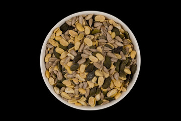 mixed seeds in wooden bowl