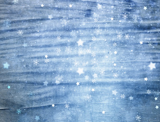 Wooden grunge background with illustrated snowfall snowflakes. Snowy winter New Year and Christmas greeting card background.