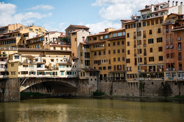 Fototapeta na wymiar Ponte Vecchio over Arno river in Florence, Italy .