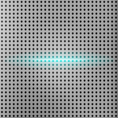 Beam of light with metallic grid background.