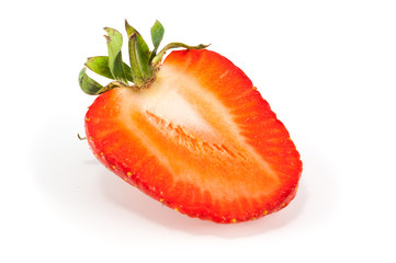 Half of strawberry isolated on white background