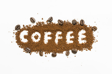 Coffee powder make wording COFFEE with coffee bean compose and white background. Can use this picture for advertise are other project.