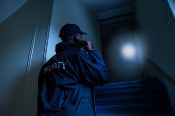 Security Guard With Flashlight