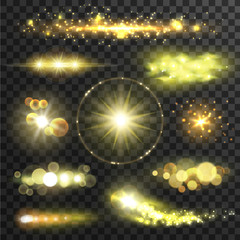 Golden glittering stars with lens flare effect