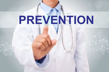 Doctor hand touching prevention sign on virtual screen. medical concept