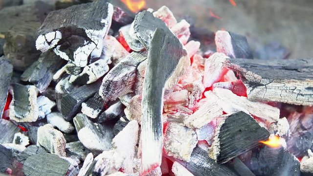 Coals burning in the brazier for barbecue.