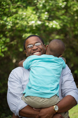 Fototapeta premium Father hugging his son.