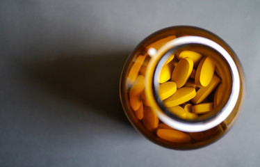 Top view of medicine in medical bottle .