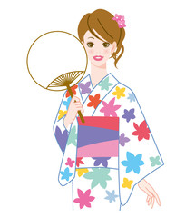 浴衣を着た女性と団扇