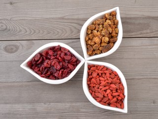 Cranberries.  Dried cranberries, goji and mulberries.