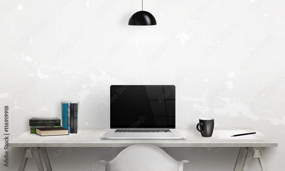 Poster writing book on a laptop. clean scene of the desk in office or room. blank screen for mockup.