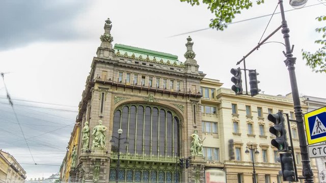 Traffic on Nevsky prospect near Eliseevsky store timelapse hyperlapse - the Comedy Theatre of N. P. Akimova. ST. PETERSBURG, RUSSIA