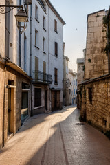 Fototapeta na wymiar Narrow street in old city centre in France