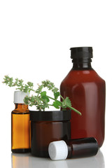 Jars of aromatic oils on isolated background. The concept of aromatherapy