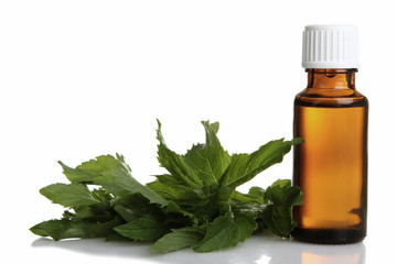 Jars of aromatic oils on isolated background. The concept of aromatherapy