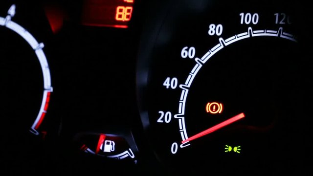 Car instrument panel illuminated at night