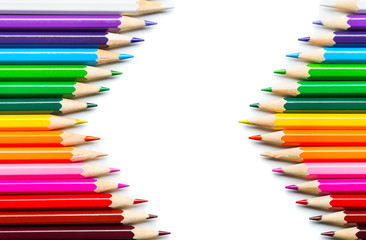 Colored pencils on white background