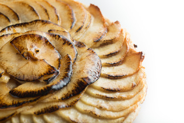 Apple pie background. Traditional french sweet dessert. Delicious, appetizing, homemade tart with slices of fresh fruits. Copy space, closeup
