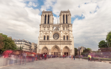 Fototapeta na wymiar Notre Dame de Paris. France. Ancient catholic cathedral on the quay of a river Seine. Famous touristic architecture landmark in summer 