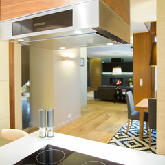Induction hob and hood in modern kitchen
