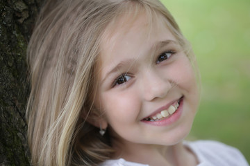 Fototapeta premium small smiling girl