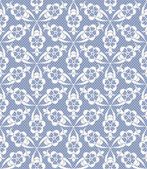 Seamless white lace pattern on blue background