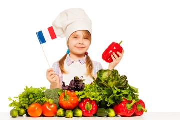 Smiling French girl preparing healthy food