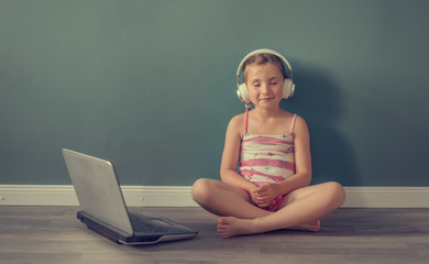 Little girl with laptop
