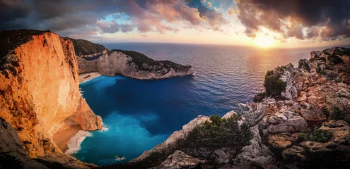 Washable wall murals Navagio Beach,  Zakynthos, Greece Sunset at Navagio Bay Zakynthos Greece. Panoramic view over the