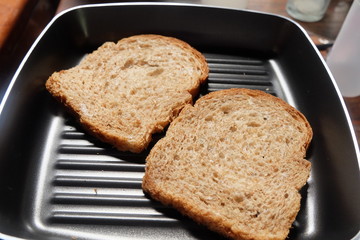 bread wheat grilling in pan
