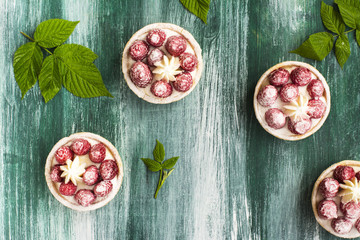 Sweet small tarts with fresh raspberry